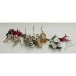 A collection novelty miniature clocks relating to planes, boats and trains