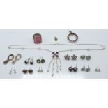 A collection of silver jewellery including a pearl and amethyst necklace, ring, earrings, pendant