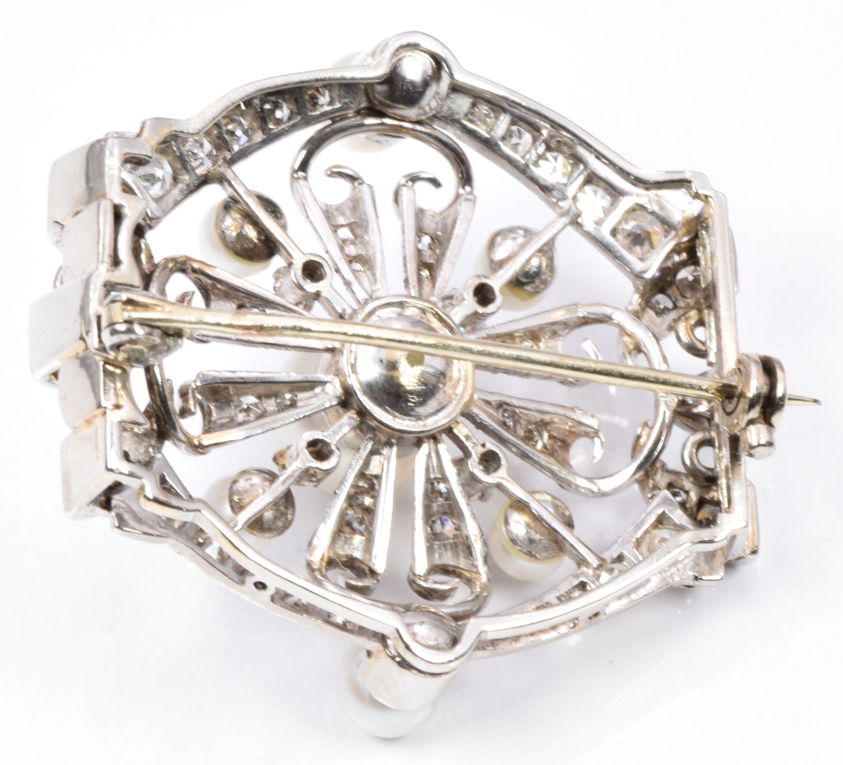 A 1930s 18ct white gold brooch set with pearls and diamonds. 11g, 3cm diam - Image 2 of 2