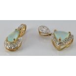 Two 9ct gold pendants set with Paraiba opals and diamonds, 3g