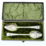 A cased pair of Georgian hallmarked silver berry spoons, Exeter 1818 maker Joseph Hicks, length