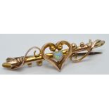 Edwardian 9ct gold brooch set with a heart cut opal cabochon in original Skinner, London box, 1 x