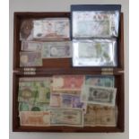 An amateur collection of UK and overseas banknotes to include O'Brien £5 CO1 487877, Isle of Man ten