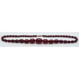 Cherry amber graduated bead necklace made up of 45 oval beads, 45g