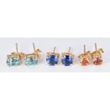 Three pairs of 9ct gold earrings set with twilight topaz, aquamarine and blue topaz