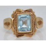 A 9ct gold ring set with blue topaz, 3.0g, size N