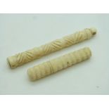 Two 19thC turned ivory needle cases including a stanhope for Ilfracombe, longest 11cm