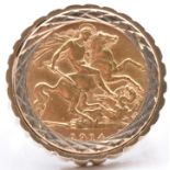 A 1914 gold half sovereign in a 9ct gold ring mount, 10.6g, size R