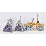 A pair of 9ct gold earrings set with trilliant cut blueberry quartz and a pair of 9ct gold