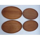 Three Dennis French Arts and Crafts style carved wood oval bowls, width 29cm