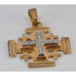 An 18k gold cross pendant set with diamonds engraved Jerusalem verso, 4.1g