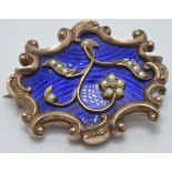 Victorian mourning brooch set with blue guilloché enamel, seed pearls and a diamond, verso a glass