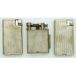 Three various Dunhill petrol lighters