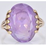 A 9ct gold ring set with an oval cut amethyst, 4.0g, size N