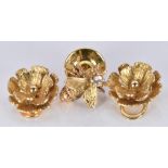 A 14k gold pin in the form of a bee (1.4g) and a pair of 9ct gold floral earrings (3.5g)