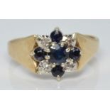 A 9ct gold ring set with sapphires and diamonds, 3.6g, size O