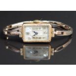 Art Deco style 9ct gold ladies wristwatch with blued hands, gold Arabic numerals, silver dial,