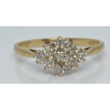 A 9ct gold ring set with diamonds totalling approximately 0.25ct, 2.2g, size P