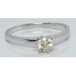 A 14k white gold ring set with a round cut diamond of approximately 0.3ct, 2.7g, size S