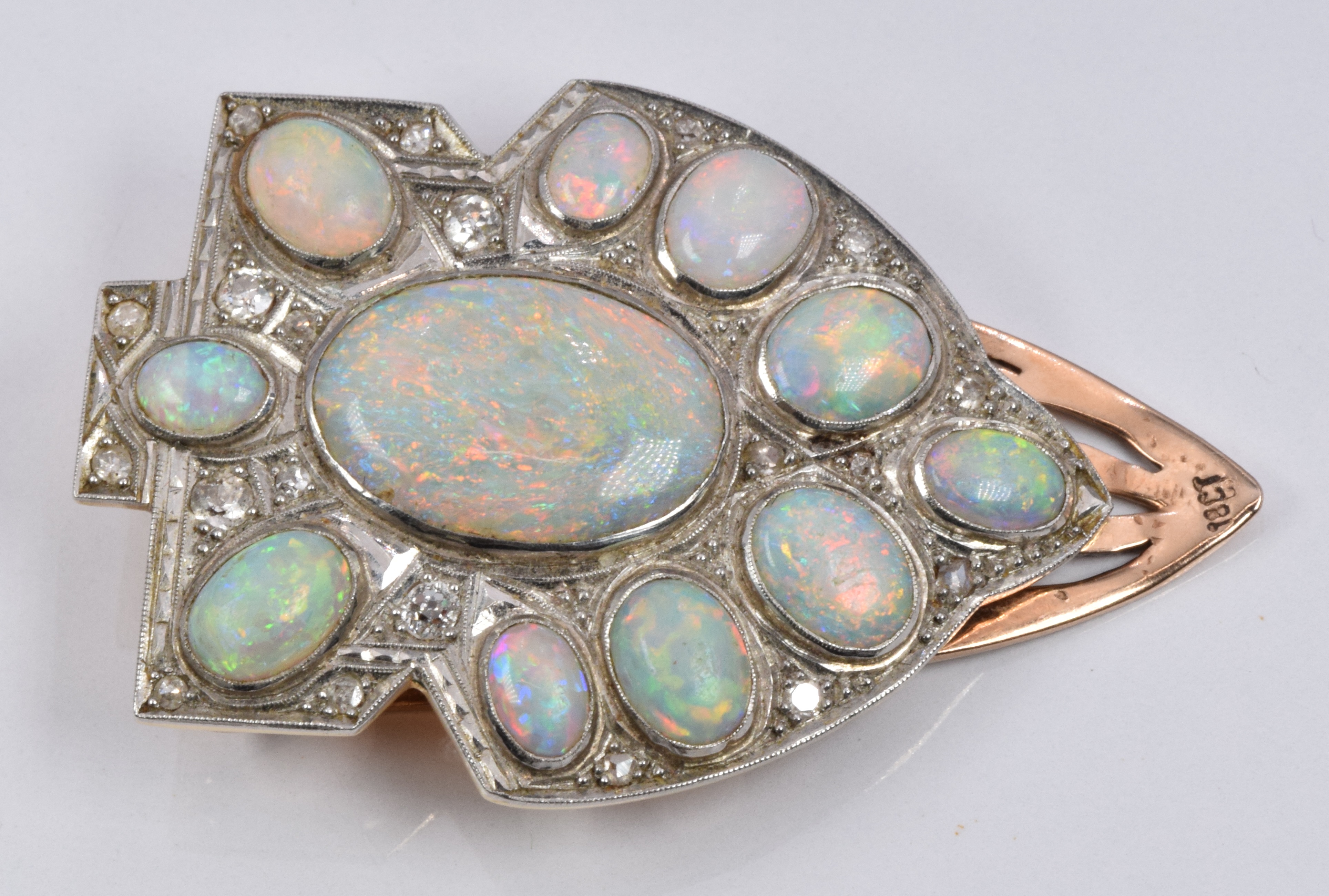 Art Deco 18ct gold clip set with oval opal cabochons and diamonds. W- 3cm - L-13cm, 13g