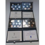 Royal Mint UK proof coin collections in deluxe cases with certificates, 1987-1990