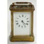 Late 19th/ early 20thC brass carriage clock with Roman enamelled dial, 'Leo' stamp to back plate and