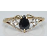 A 9ct gold ring set with a pear cut sapphire and cubic zirconia, 1.9g, size R