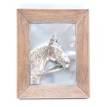 Silver plated plaque depicting a horse's head, overall size 42 x 35cm