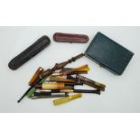 Cheroot or cigarette holders to include 9ct gold mounted and cased examples