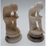 Two alabaster Grand Tour figurines of seated ladies, raised on circular bases, height 15cm