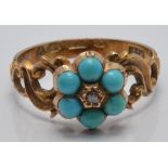 Victorian ring set with a rose cut diamond and turquoise, verso a glass compartment set with hair,