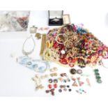 A collection of costume jewellery including diamanté, silver pendants, vintage earring, beads etc