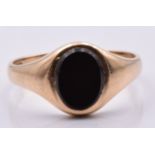 A 9ct gold signet ring set with onyx, 2.8g, size N