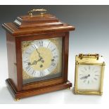 An oak cased three train mantel clock marked 'Woodford' to dial and a Smith's carriage clock,