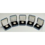 Five Royal Mint silver proof £1 coins, 1999, 2000, 2001 and two for 2002, cased with certificates