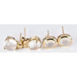 Two pairs of 9ct gold earrings set with cat's eye moonstone, origin Sri Lanka