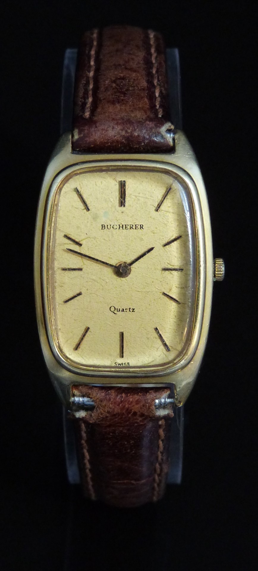 Bucherer 18ct gold wristwatch with two-tone hands and baton markers, gold dial and signed 6 jewel