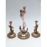 Set of three silver plated novelty candlesticks in the form of anchors with rope, height of