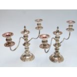 Pair of silver plated candelabra, height 24.5cm.