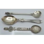 Three spoons comprising hallmarked silver jam spoon, Egyptian white metal example with hieroglyph