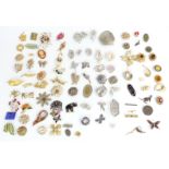 A collection of vintage brooches including Sarah Coventry, diamanté etc