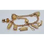 A 9ct gold charm bracelet with thirteen 9ct gold charms, 20g