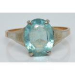 A 9ct gold ring set with blue paste, 1.8g, size L