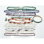 A collection of beaded necklaces including glass, pearls, malachite, agate, amethyst etc