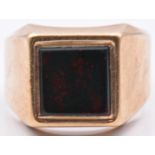 A 9ct gold signet ring set with bloodstone, 9.3g, size S