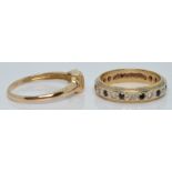 A 9ct gold eternity ring set with diamonds and sapphires (size K) and a 9ct gold ring set with a