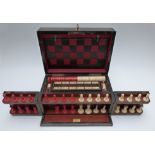 Coromandel cased 'The Royal Cabinet of Games', games compendium, with tooled leather board to lid,