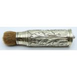 19thC gilt white metal travelling brush with fine acanthus leaf decoration, length 12cm