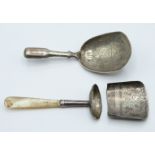 Two Georgian hallmarked silver caddy spoons, one with mother of pearl handle, Birmingham 1818