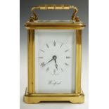 Woodford brass carriage clock c1980, the enamelled Roman dial with Breguet style hands, in brass